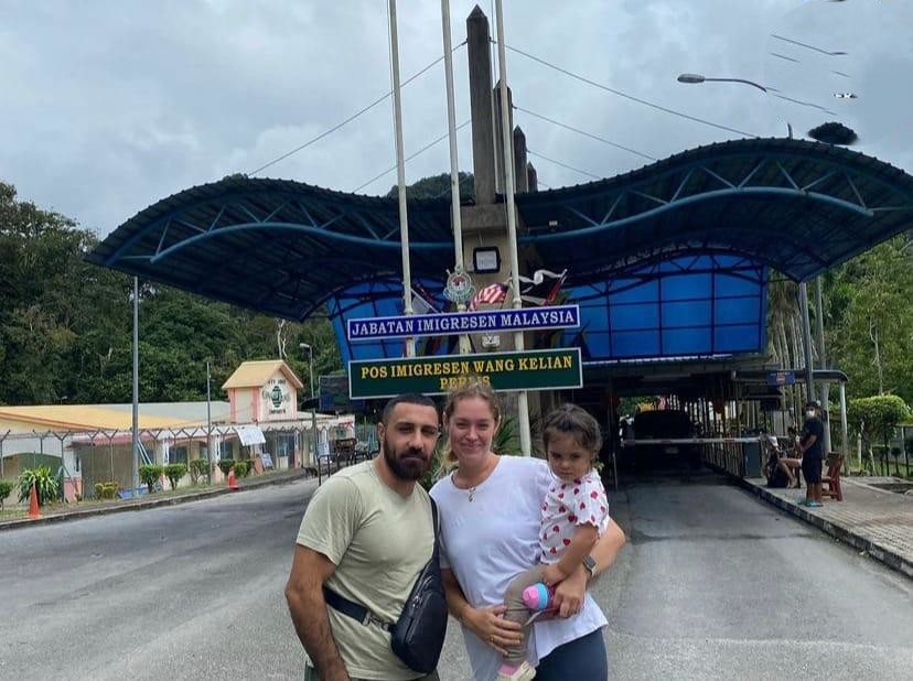 Happy family at the border checkpoint truly